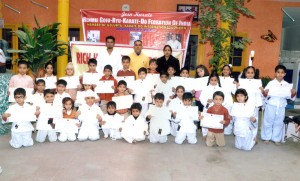 Participants of Belt Grading Test posing for a group photograph.