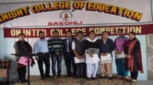 Winners of Symposium posing alongwith dignitaries at Ramisht College of Education, Plahi in Basohli.