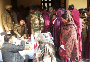 Doctors of 187 Bn CRPF providing free medicines to the patients during a medical camp at Udhampur. 