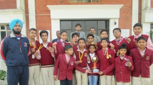 Medal winners of MV International School in Speedball Championship posing for a group photograph.   