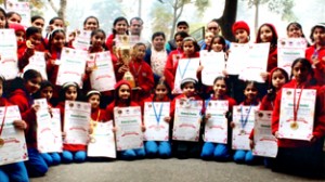 Students of Martial Art Team of Presentation Convent Senior Secondary School, Gandhi Nagar, posing with 2nd winner’s trophy, felicitation certificates and medals.