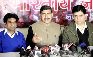 BJP State President Jugal Kishore Sharma talking to reporters at Jammu along with Party spokespersons Sunil Sethi and Balbir Ram Rattan on Tuesday.        -Excelsior/Rakesh