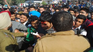 Polytechnic students being stopped by Police from disrupting traffic during protest demonstration at Bikram Chowk on Monday.