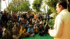 BJP candidate from Akhnoor, Rajeev Sharma addressing an election meeting in Akhnoor on Thursday.