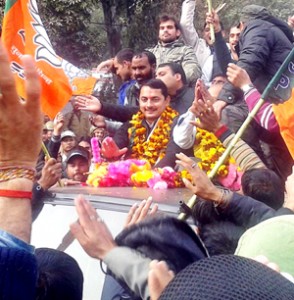 R S Pathania being accorded reception during his visit to Ramnagar on Friday.