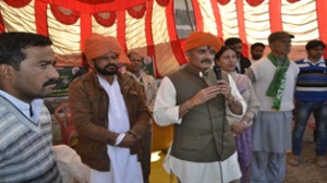 PDP leader Vikramaditya Singh addressing public meeting at Ghordhi in Chenani Constituency on Sunday.