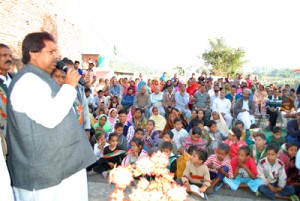 Minister for Housing Raman Bhalla addressing election rally on Friday.
