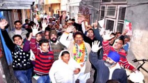 Housing Minister Raman Bhalla during door-to-door campaign on Friday.