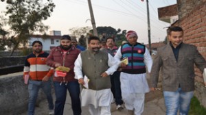 NC candidate Dharamveer Singh Jamwal campaigning in Jammu West on Thursday.