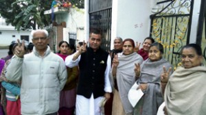 Independent candidate from Jammu West, Sanjay Gupta during his door-to-door campaign. 