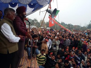 Navjot Singh Sidhu addressing rally during campaigning for Marh constituency candidate Sukhnandan Kumar.
