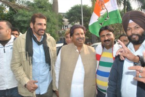 Minister for Housing Raman Bhalla and Mukesh Rishi during door-to-door campaign on Saturday.