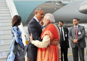 President Barack Obama arrives in India, PM Modi welcomes him with a hug