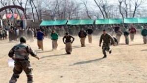 Pulwama youth enjoying sporting activity during 'Chilai Kalan' Mela on Monday. 