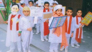 Students of KC Public School holding placards during Walk with a difference in the School premises.