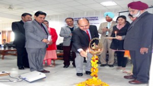 Dignitaries lighting ceremonial lamp while inaugurating workshop on ESDM at IETE.