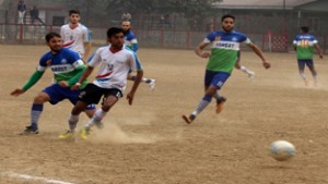 Players in action during football match at GGM Science College ground on Tuesday. —Excelsior/Rakesh