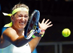 Victoria Azarenka of Belarus hits a return to Sloane Stephens of the U.S. during women's singles first round match at the Australian Open 2015 tennis tournament in Melbourne on Tuesday. (UNI)