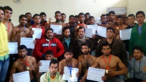 Winners of District Wrestling Championship posing for group photograph at Kathua.