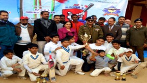 Winning teams of X-Mas and NewYear Under 14 (boys) Test Series posing for group photograph with DIG Jammu-Kathua Range Shakeel Ahmed Beig and others during closing ceremony.