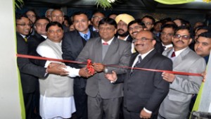 President ICAI K Raghu alongwith MLA Sat Sharma and others inaugurating newly constructed office building of J&K Branch of ICAI at Jammu on Wednesday.