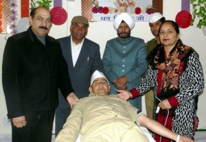 A devotee of Nirankari Mission donating blood during a camp at Bishnah. 