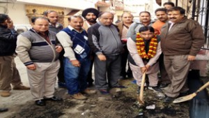 Sat Sharma, MLA Jammu West kick-starting construction work of drain at Rehari on Tuesday.