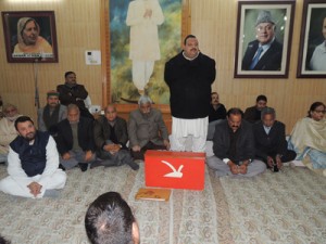 NC provincial president Devender Rana addressing party leaders at Sher-e-Kashmir Bhawan on Friday.