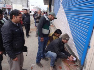 JMC authorities sealing an establishment on Wednesday.