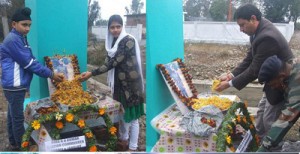 Floral tributes being paid to Shaheed Piar Singh in Kathua. 