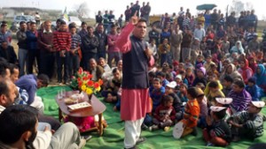 MLA Ravinder Raina addressing a gathering at Sunderbani in Rajouri on Sunday.