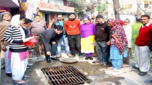 Vikram Malhotra launching iron grating work at Prem Nagar in Ward No.7 of Jammu East Constituency.