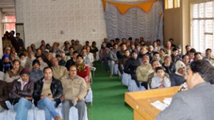 MLA R S Pura, Dr Gagan Bhagat addressing a public meeting at Maralia on Sunday.