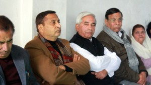 Former Minister Sham Lal Sharma, flanked by BCC members during meeting at Akhnoor on Thursday.