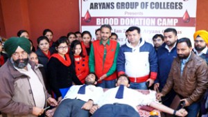 Students donating blood during a camp by Aryans Institute of Nursing on Wednesday.