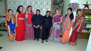 Females wearing beautiful dresses and jewellery during launch of wedding makeover by Colour Lounge Salon.