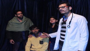 A scene from 'Ek Lamhaa' staged by Nav Durga Kala Manch in Jammu on Friday.
