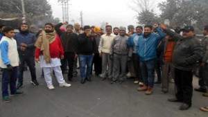 Residents raising slogans during protest at Muthi.