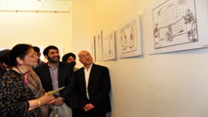 Usha Vohra alongwith other dignitaries evincing keen interest in international exhibition at Kala Kendra in Jammu on Friday.