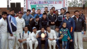 Winning team of 2nd quarter final match of the ongoing 5th Police Martyr Memorial NZ T20 Cricket Tournament posing for a group photograph at Kathua.