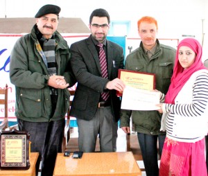 Winner being felicitated by the dignitaries during Islamia College Carrom Championship in Srinagar on Monday.