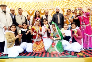 Winners of cultural event posing for a group photograph at GDC Billawar on Monday.