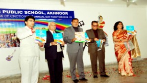 Former Minister, Sham Lal Sharma and other dignitaries releasing Annual Magazine at DCM Public School in Akhnoor.