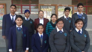 Students of SOS Hermann Gmeiner School, Gole Gujral, Jammu who excelled in Science Exhibition posing for a group photograph along with School Management.  