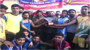 Triumphant Allah-A Volleyball team posing for a group photograph along with chief guest and other dignitaries at Bishnah on Sunday.  