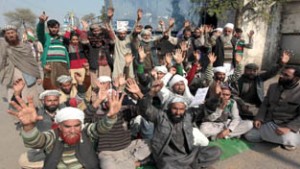 Gujjar-Bakarwals protesting for extension of Forest Right Act to J&K at Jammu on Thursday.        —Excelsior/Rakesh