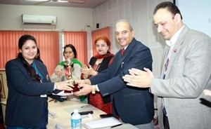 Winner receiving award during valedictory function of the Symposium at MIER in Jammu on Friday.