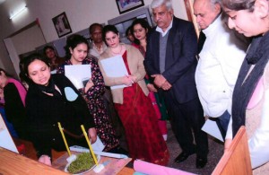 Dignitaries and students during the competition on low cost teaching aids at Chenab College of Education.