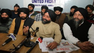 Sikh United Front leader Avtar Singh Khalsa addressing press conference in Jammu on Thursday. -Excelsior/ Rakesh 