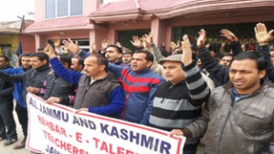 ReT teachers staging protest at Udhampur on Sunday.